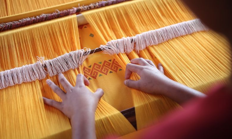 how did the invention of the weaving loom impact Mesopotamia